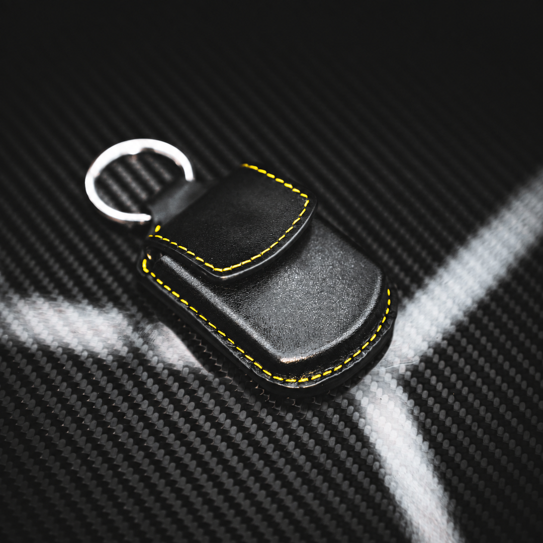 Racing Yellow Leather Porsche Tracker Holder
